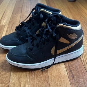 Nike Air Jordan Black and Gold High-Top Sneakers
